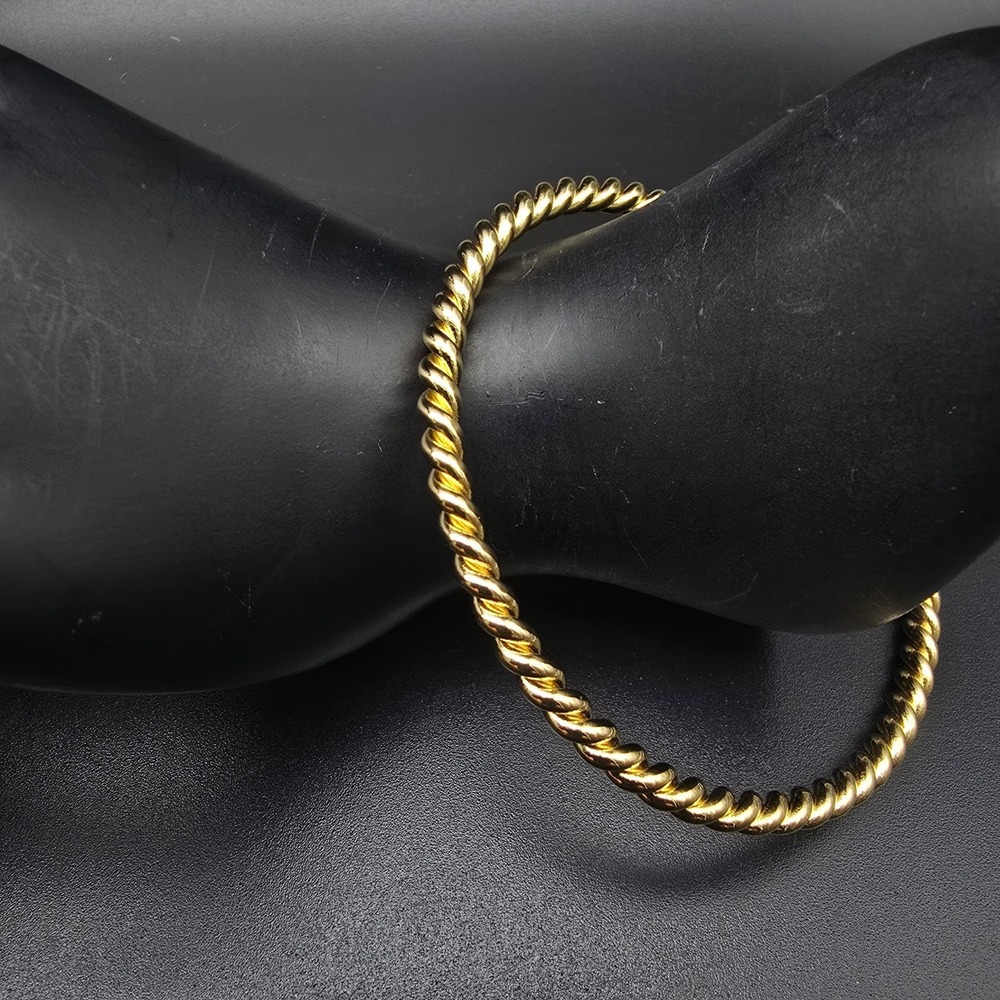 Avon Gold Tone Twisted Bangle Bracelet Vintage 1990s Costume Jewelry